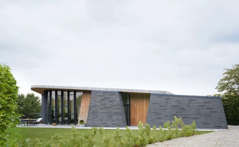Современный дом «Бумеранг» от студии AJG Architects
